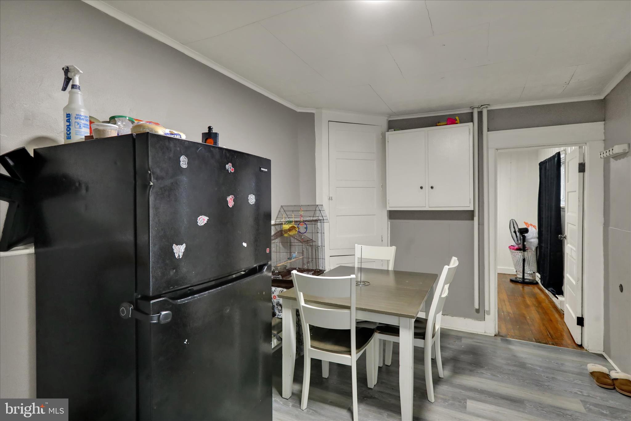 1410 Cotton Street Reading, PA 19602 - Photo 7 of 37 a kitchen with a table and chairs