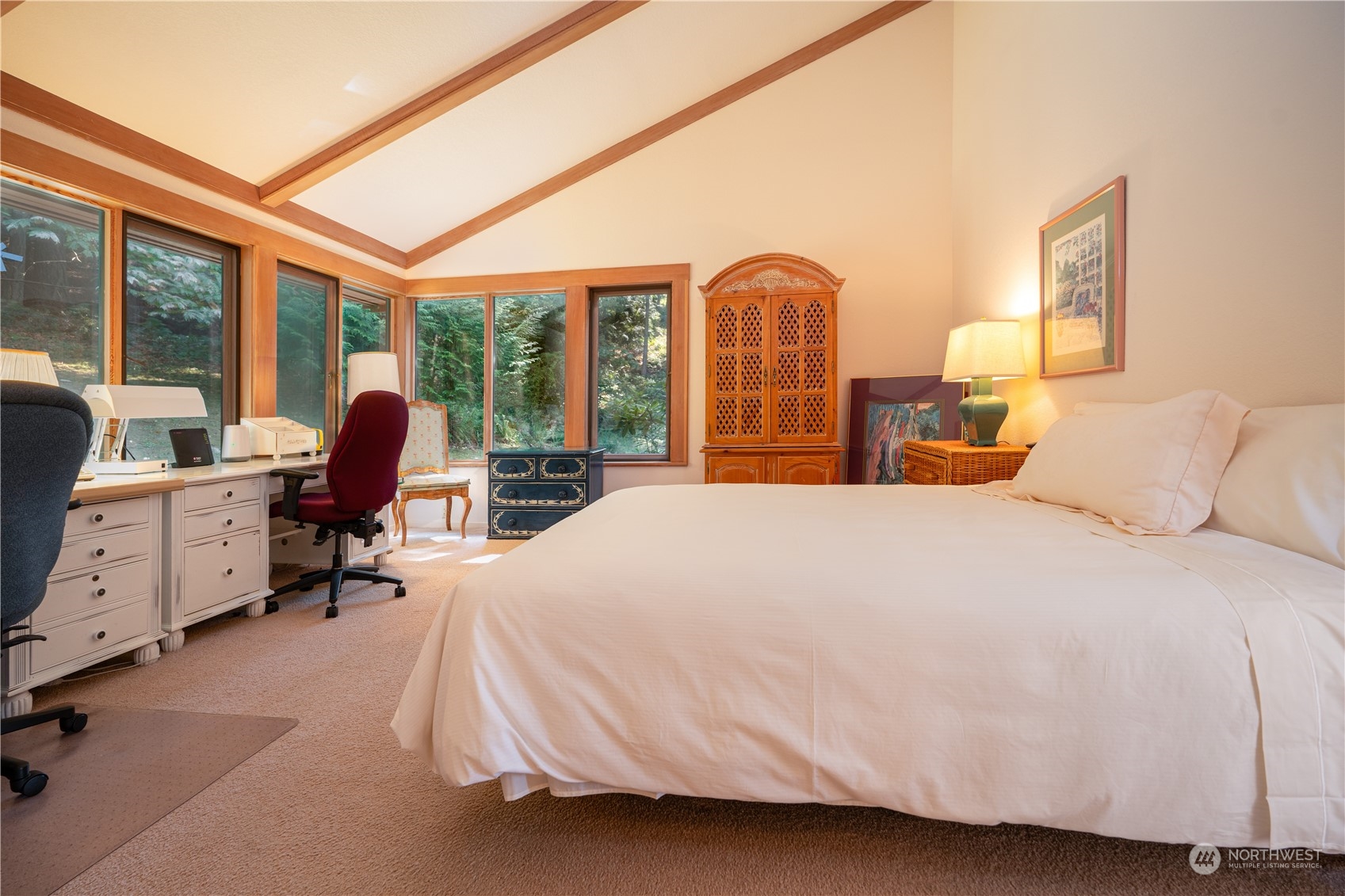 934 Mitchell Bay Road Friday Harbor, WA 98250 - Photo 17 of 40 a bed room with a bed and a large window