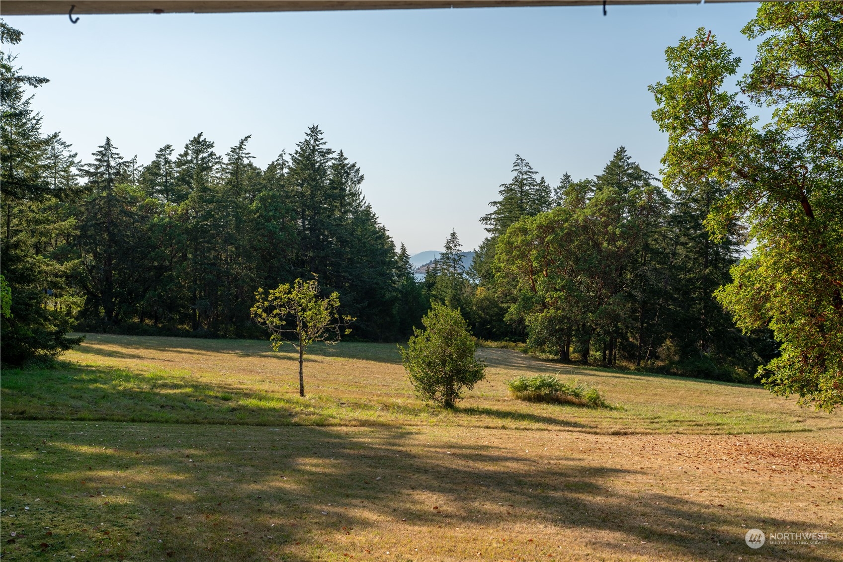 934 Mitchell Bay Road Friday Harbor, WA 98250 - Photo 32 of 40 a swimming pool with an outdoor space and seating area