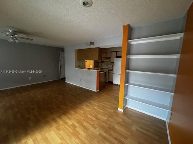 1227 Southwest 46th Avenue, Unit 314 Pompano Beach, FL 33069 - Photo 14 of 36 a view of workspace with wooden floor