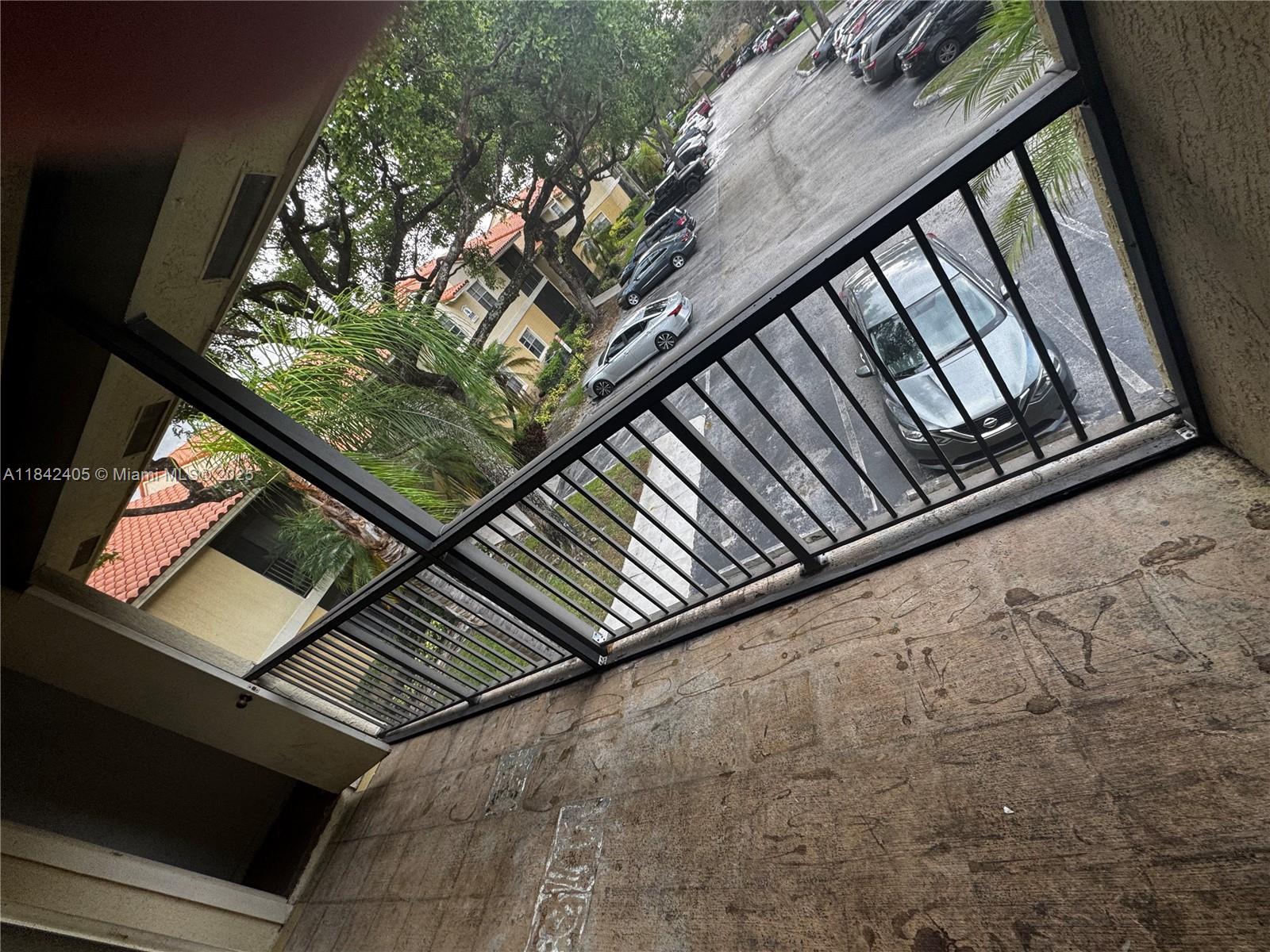 1227 Southwest 46th Avenue, Unit 314 Pompano Beach, FL 33069 - Photo 16 of 36 a close up of a street