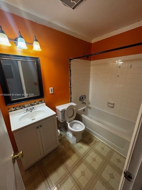 1227 Southwest 46th Avenue, Unit 314 Pompano Beach, FL 33069 - Photo 24 of 36 a bathroom with a granite countertop sink toilet and shower