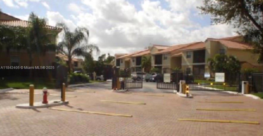 1227 Southwest 46th Avenue, Unit 314 Pompano Beach, FL 33069 - Photo 3 of 36 a view of a building with street view