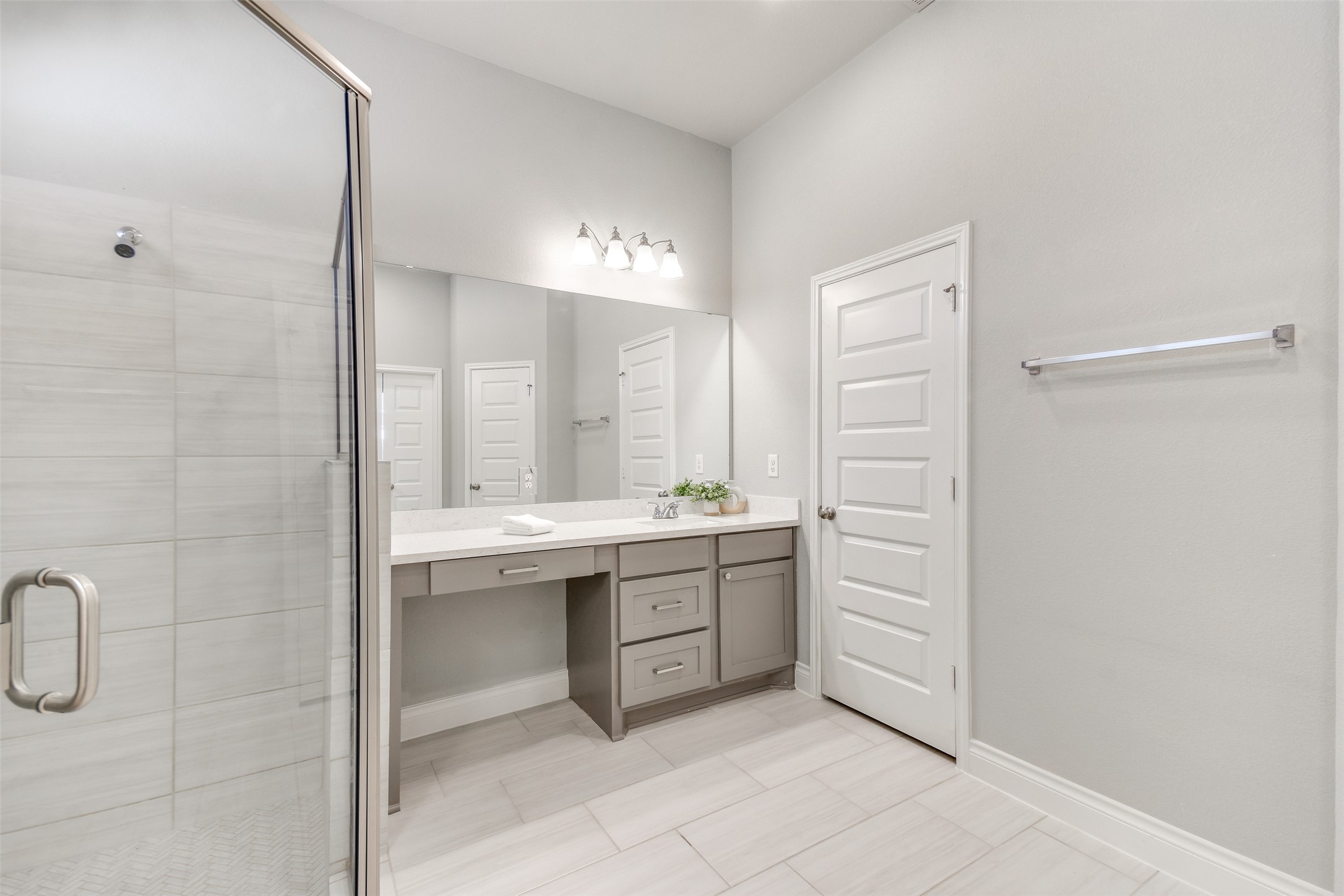 228 Pisa Lane Georgetown, TX 78628 - Photo 12 of 28 a bathroom with a sink and a mirror