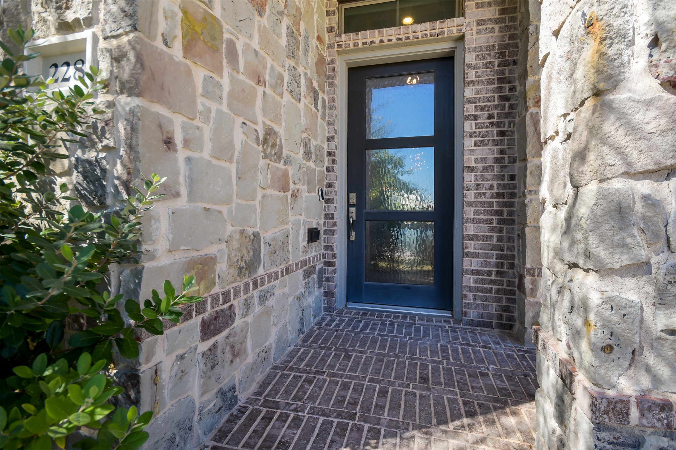 228 Pisa Lane Georgetown, TX 78628 - Photo 2 of 28 a view of a brick house with a large door