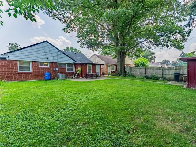 a house view with a garden space