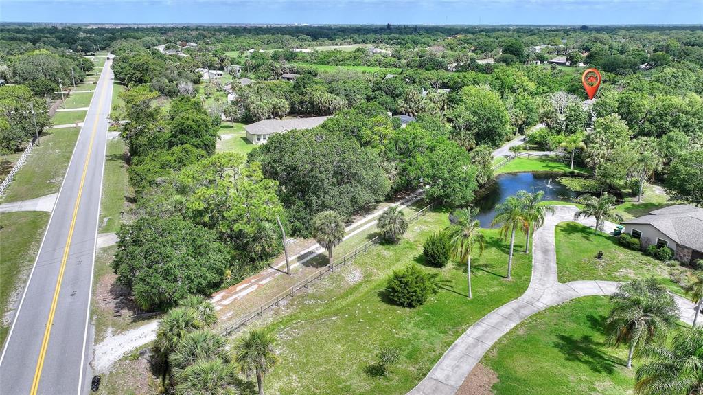 3641 Turtle Mound Road Melbourne, FL 32934 - Photo 3 of 77 a view of a garden
