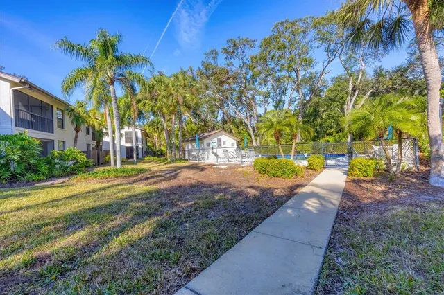 a view of swimming pool with a patio