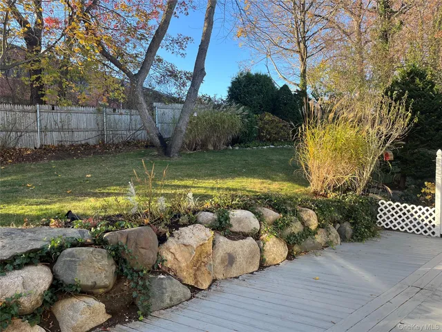 a view of a swimming pool with a lounge chair