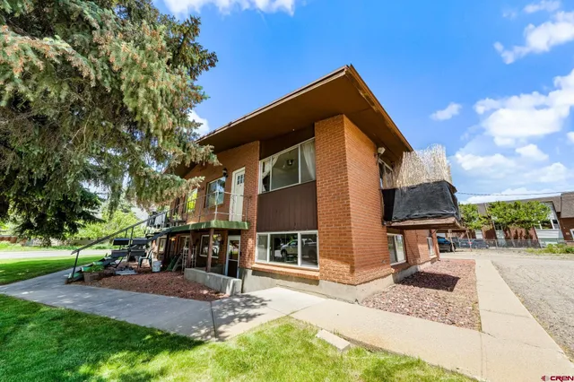 a front view of a house with entertaining space