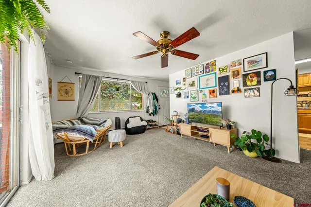 a room with furniture and a window