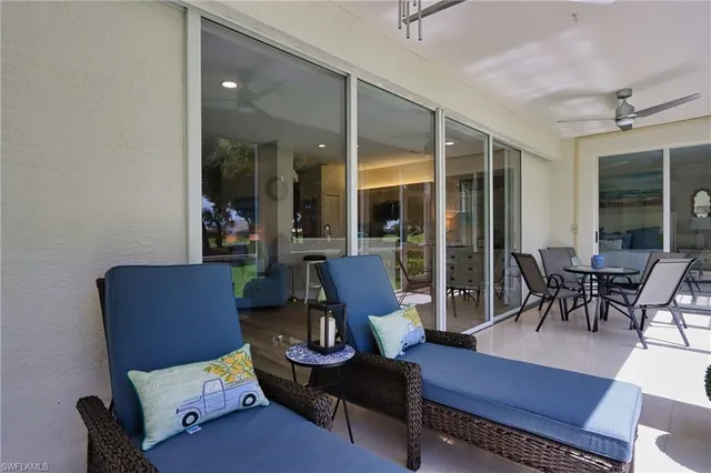a view of a livingroom with furniture and window