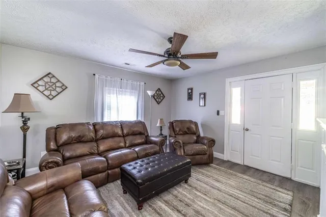 a living room with furniture and a couch
