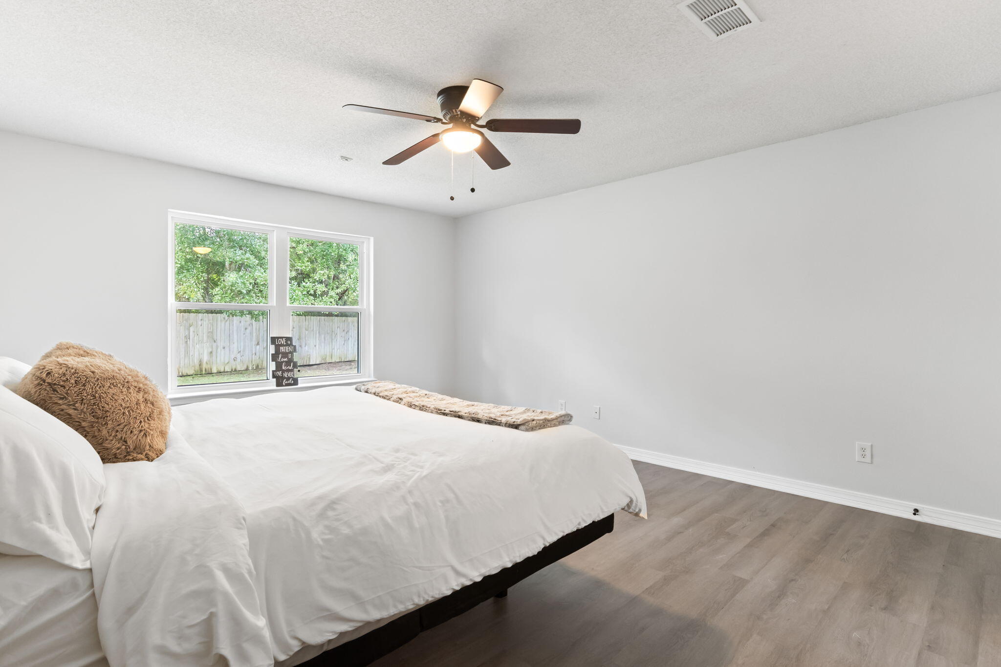 3650 Berrypatch Lane Pace, FL 32571 - Photo 21 of 53 a bedroom with a bed and window