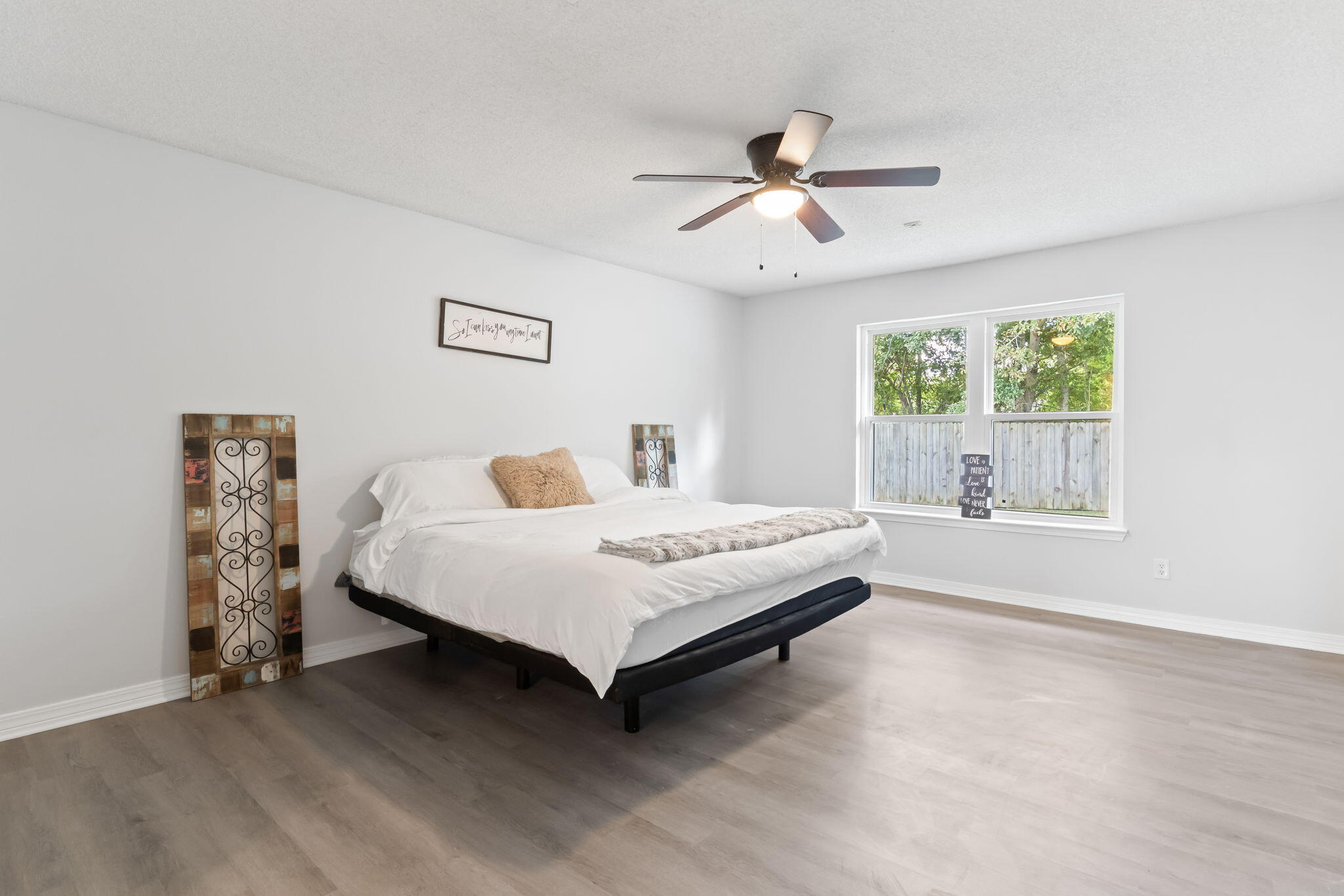 3650 Berrypatch Lane Pace, FL 32571 - Photo 23 of 53 a bedroom with a bed and a window