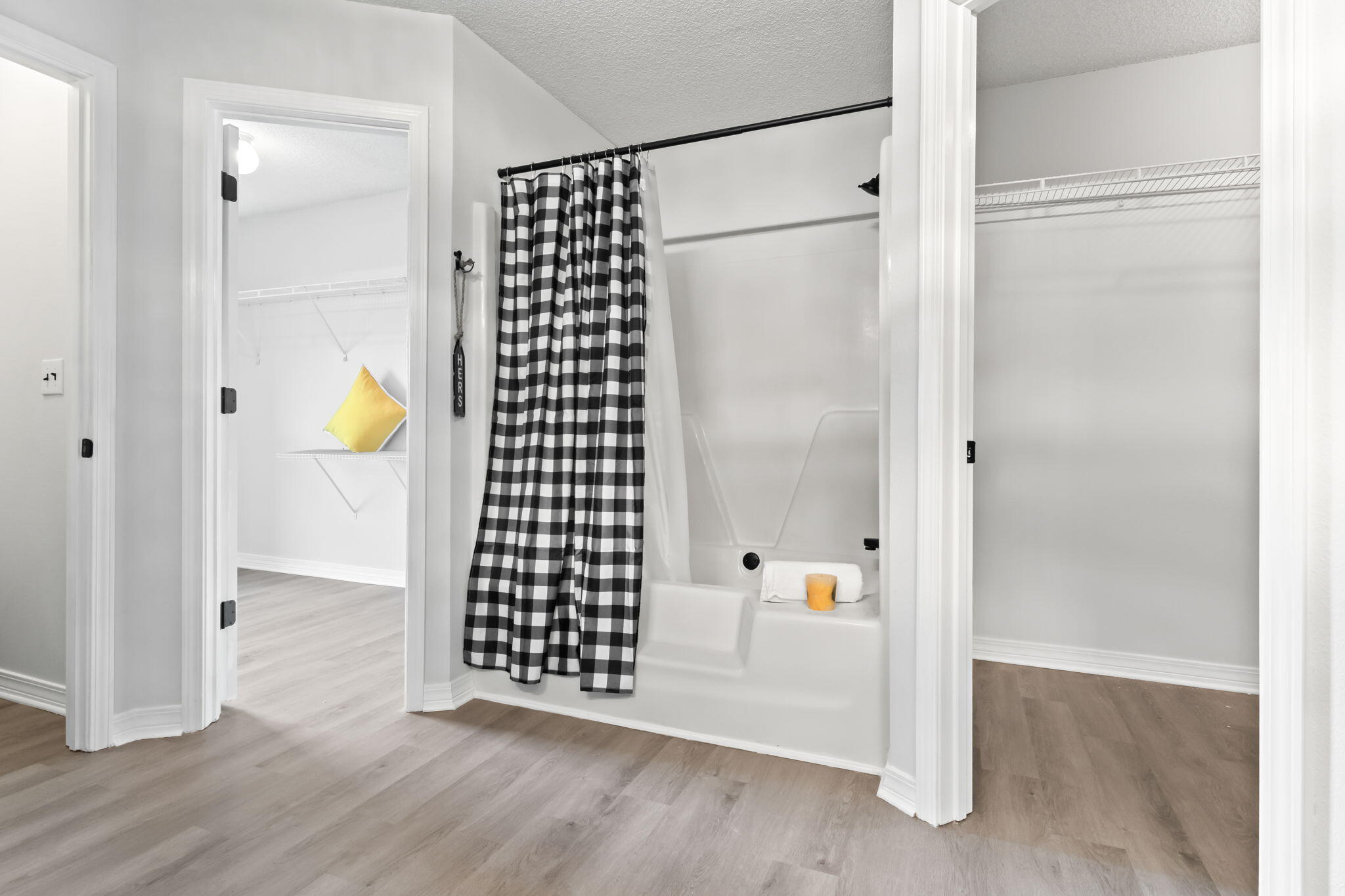 3650 Berrypatch Lane Pace, FL 32571 - Photo 25 of 53 a view of an empty room with wooden floor and a window