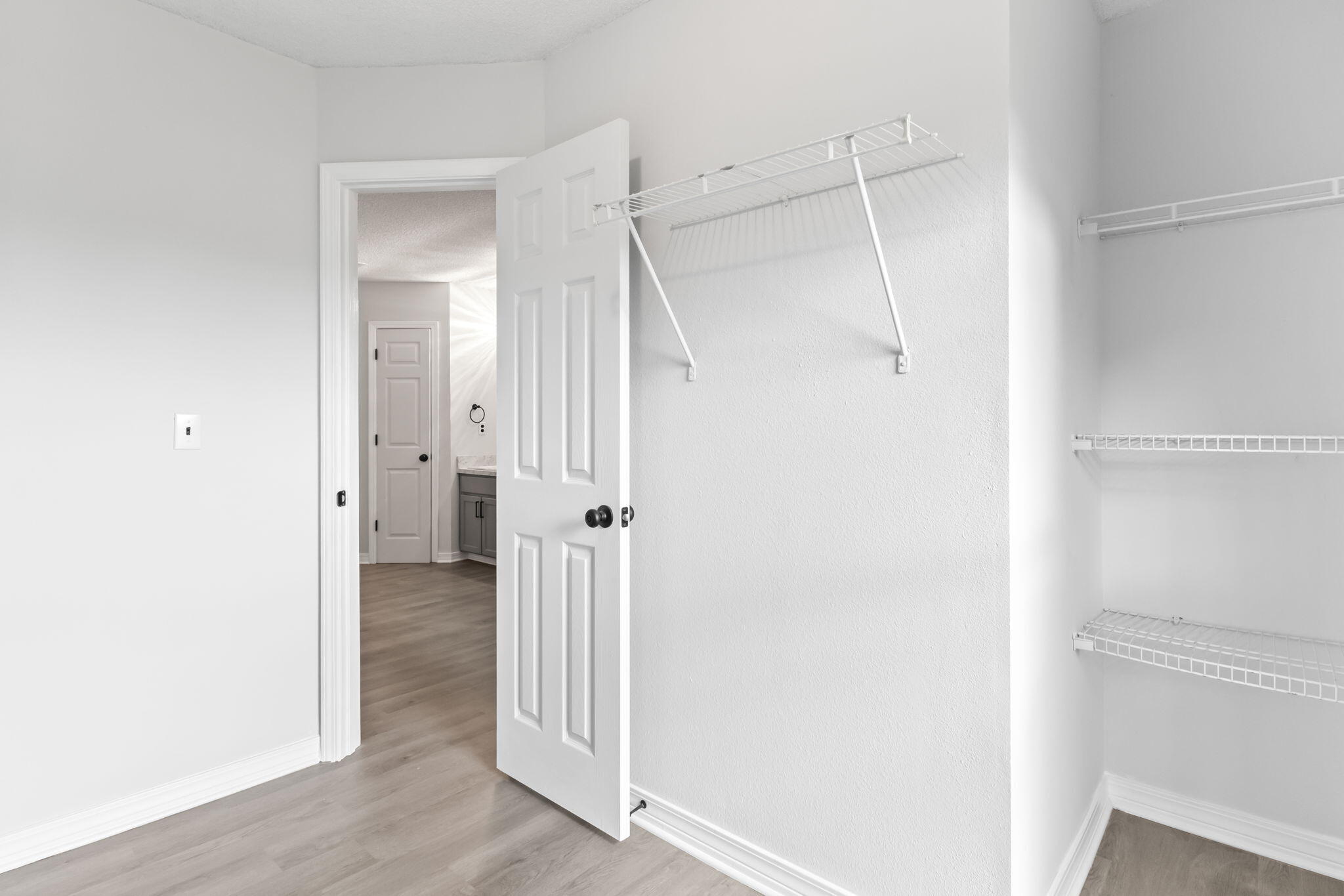 3650 Berrypatch Lane Pace, FL 32571 - Photo 28 of 53 a view of a bathroom with wooden floor