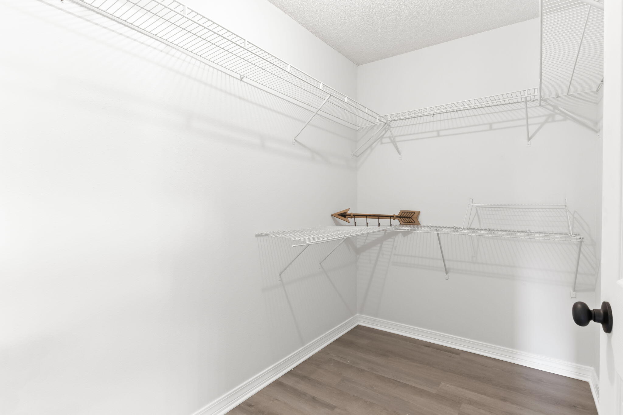 3650 Berrypatch Lane Pace, FL 32571 - Photo 30 of 53 a view of a room with racks on the wall