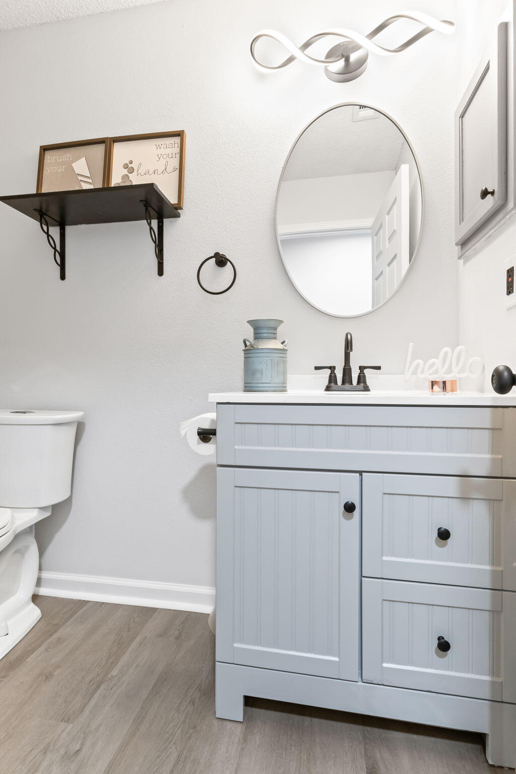 3650 Berrypatch Lane Pace, FL 32571 - Photo 42 of 53 a bathroom with a double vanity sink and a mirror