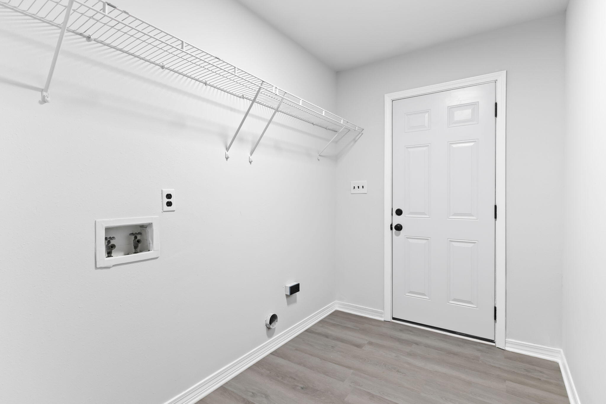 3650 Berrypatch Lane Pace, FL 32571 - Photo 43 of 53 a view of a room with wooden floor