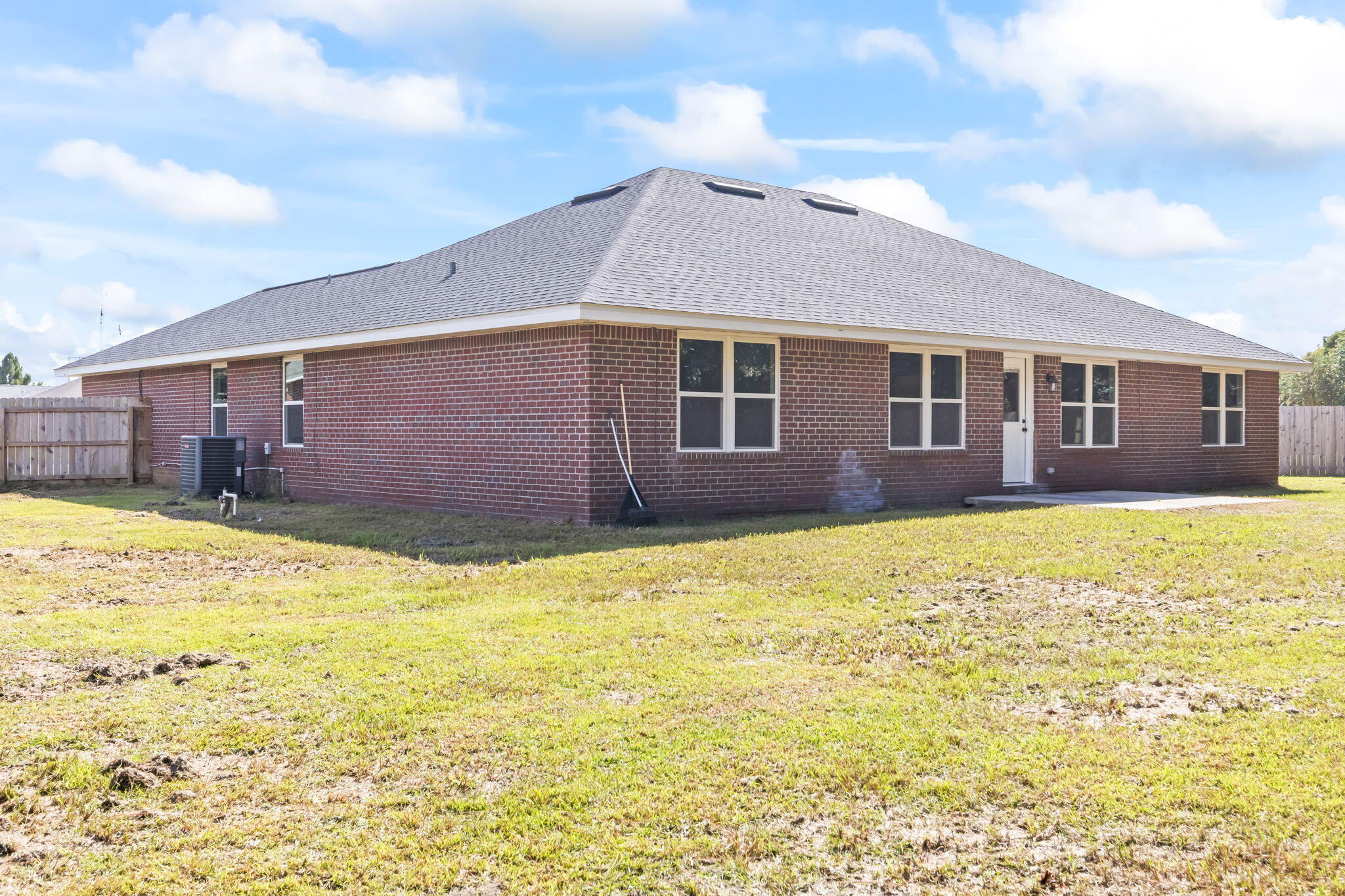 3650 Berrypatch Lane Pace, FL 32571 - Photo 50 of 53 a view of a house with a swimming pool