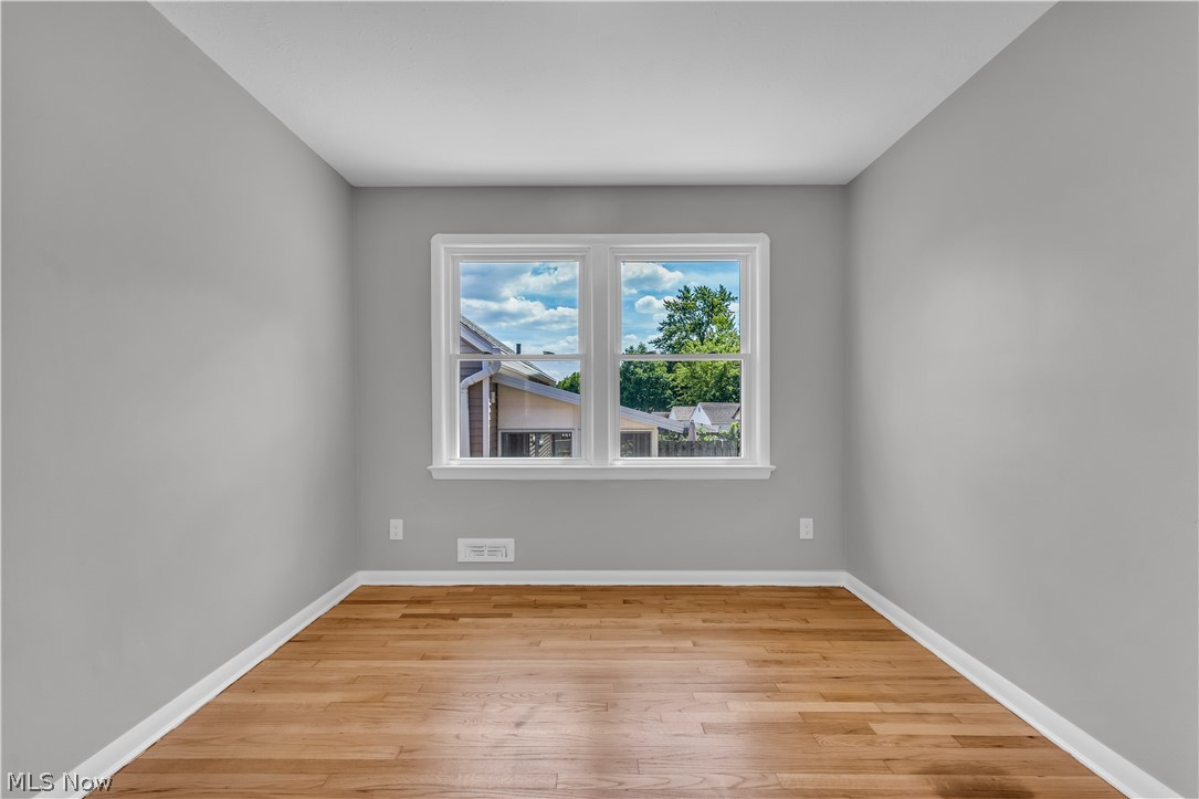 4322 Roadoan Road Brooklyn, OH 44144 - Photo 17 of 27 Empty room featuring light hardwood / wood-style floors