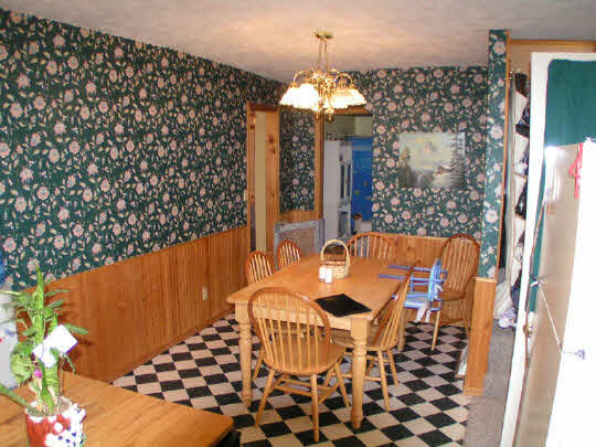 6682 East Flagg Road Ashton, IL 61006 - Photo 3 of 6 a view of a dining room with furniture and chandelier