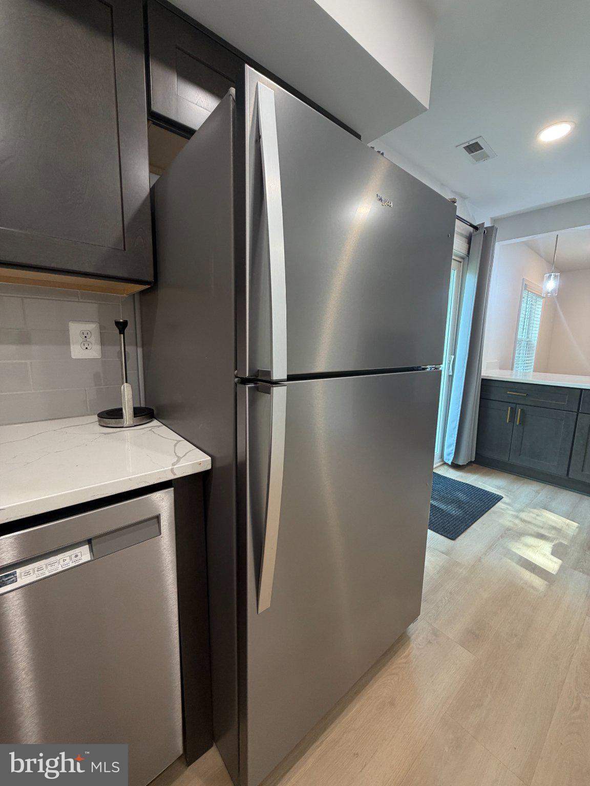 7905 Chalice Road Severn, MD 21144 - Photo 17 of 56 Sleek stainless steel appliances shine.