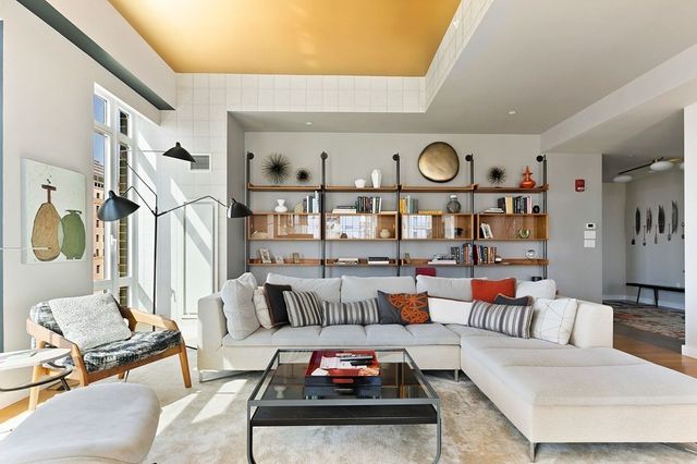 a living room with furniture and rug