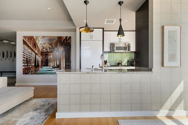 a bathroom with sink and mirror
