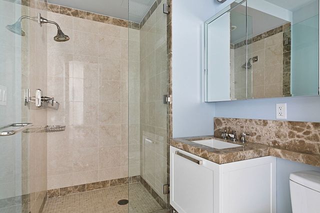a view of a storage and utility room with closet
