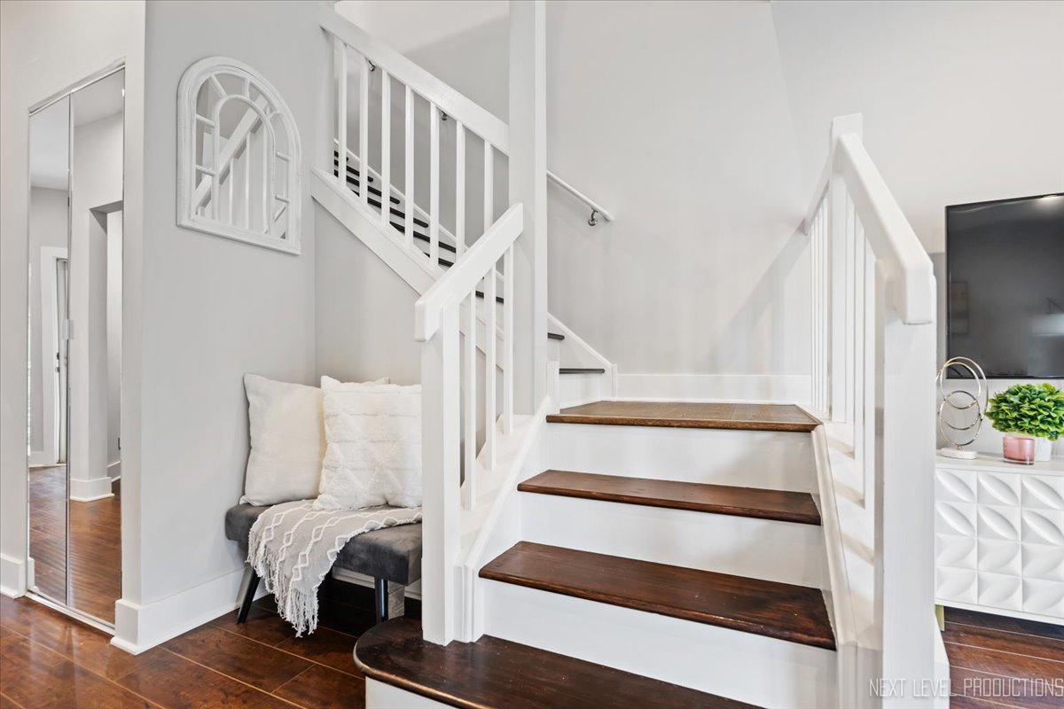 1257 Rhodes Lane Naperville, IL 60540 - Photo 12 of 24 a view of entryway with wooden floor and windows