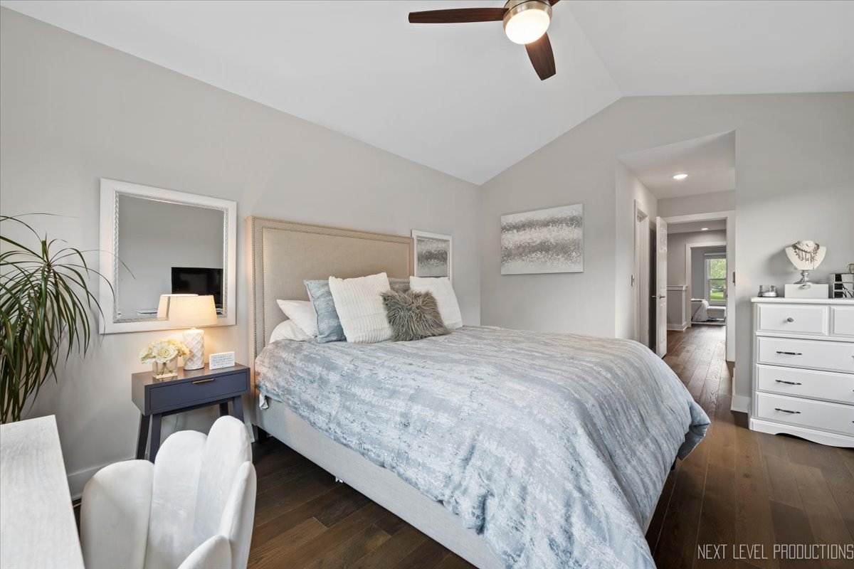 1257 Rhodes Lane Naperville, IL 60540 - Photo 15 of 24 a bedroom with bed and wooden floor