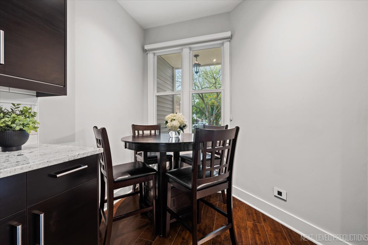1257 Rhodes Lane Naperville, IL 60540 - Photo 6 of 24 a view of a dining room with furniture and window