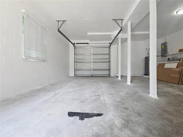 a view of an empty room with a cabinet