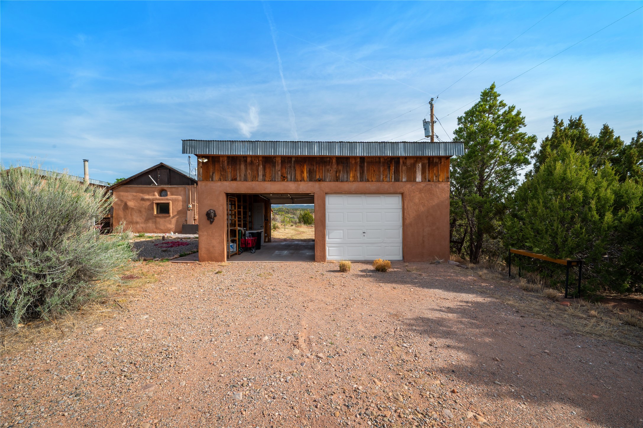 3-4 County Rd B41C San Jose, NM 87565 - Photo 22 of 41 2 car garage with storage and a freezer pantry.