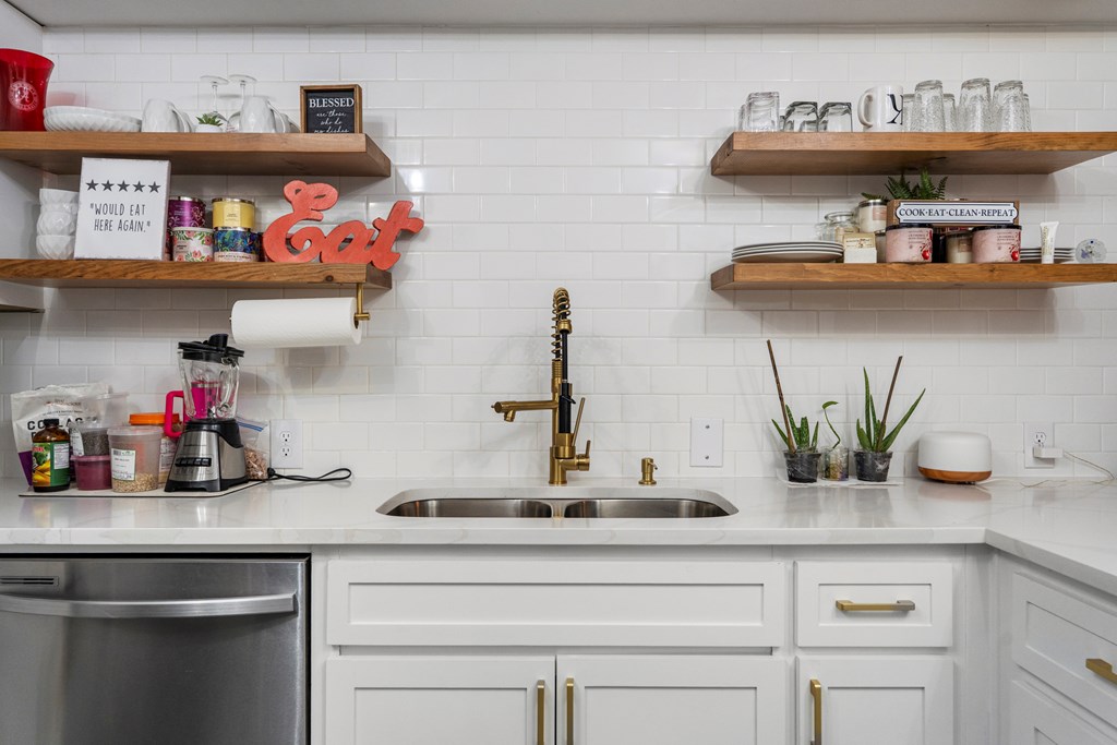 2525 Norris Road, Unit 38 Columbus, GA 31907 - Photo 11 of 27 a kitchen with a sink a potted plant and a potted plant
