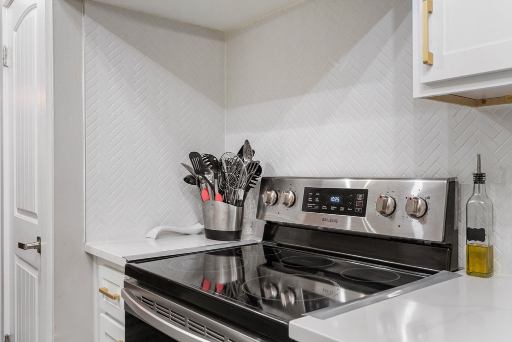 2525 Norris Road, Unit 38 Columbus, GA 31907 - Photo 13 of 27 a kitchen with a stove and a microwave
