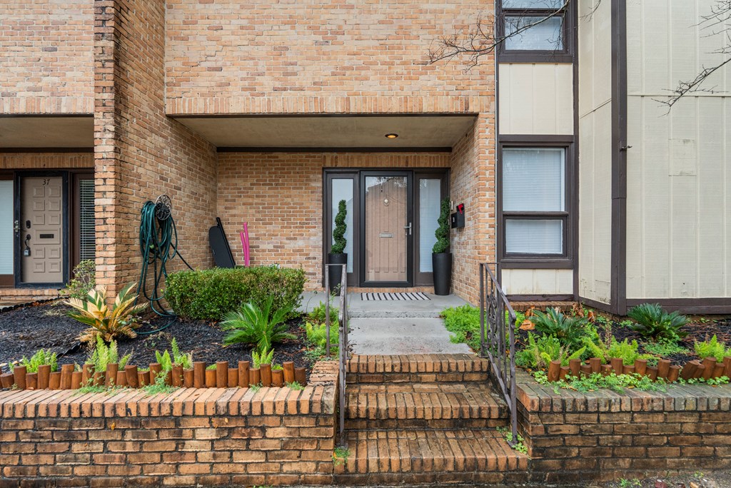 2525 Norris Road, Unit 38 Columbus, GA 31907 - Photo 2 of 27 a front view of a house with a yard