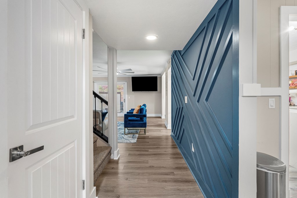 2525 Norris Road, Unit 38 Columbus, GA 31907 - Photo 3 of 27 a view of a hallway with wooden floor and staircase