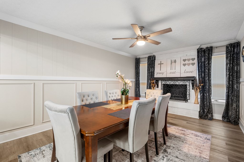 2525 Norris Road, Unit 38 Columbus, GA 31907 - Photo 8 of 27 a view of a dining room with furniture and a fireplace