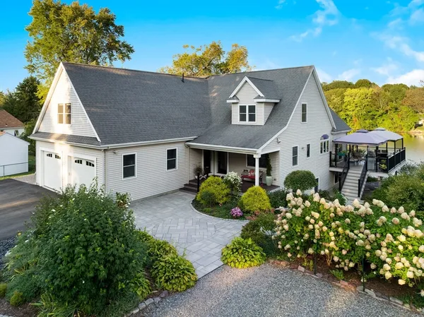 front view of a house with a yard