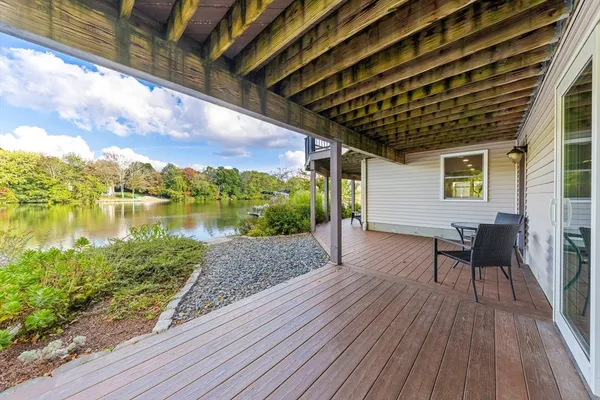 a porch with seating space and yard