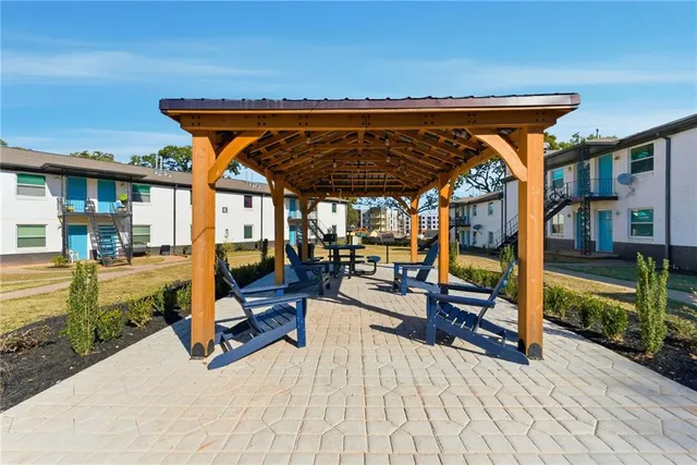 a view of a swimming pool with a patio