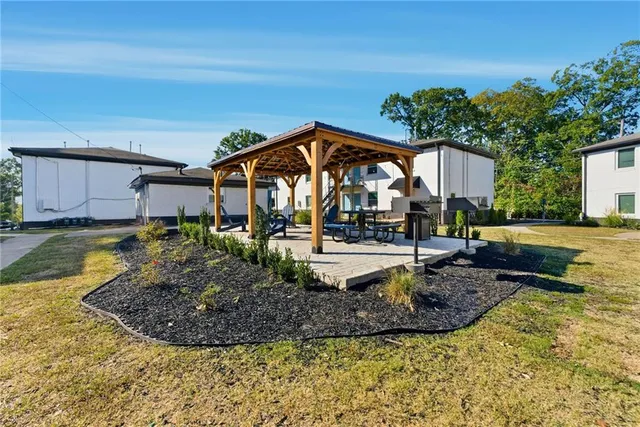 a view of a yard with a fountain