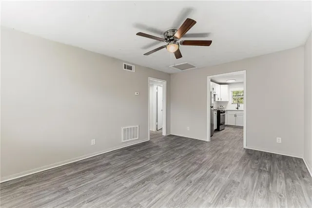 a view of an empty room and window