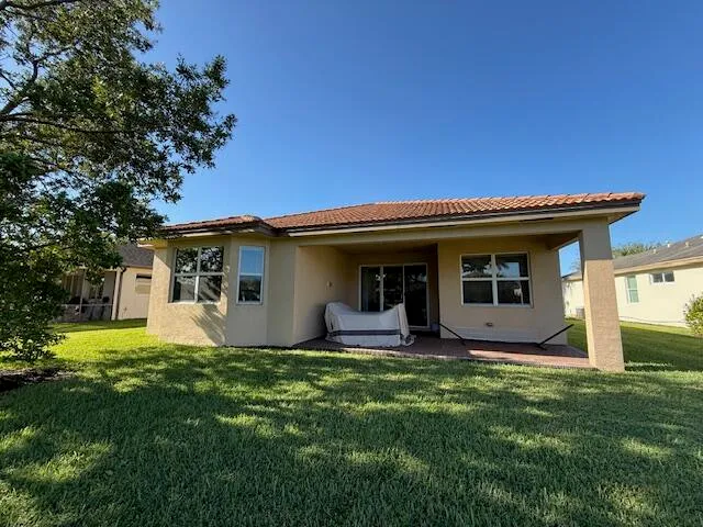 a view of livingroom with furniture wooden floor and windows