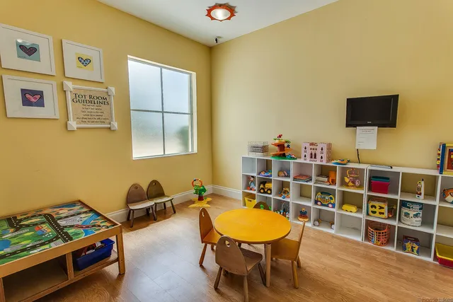 a front view of house with a street