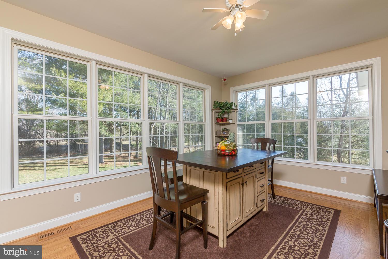 228 Southbank Road Landenberg, PA 19350 - Photo 14 of 46 Bright, sunny eating area overlooking the backyard