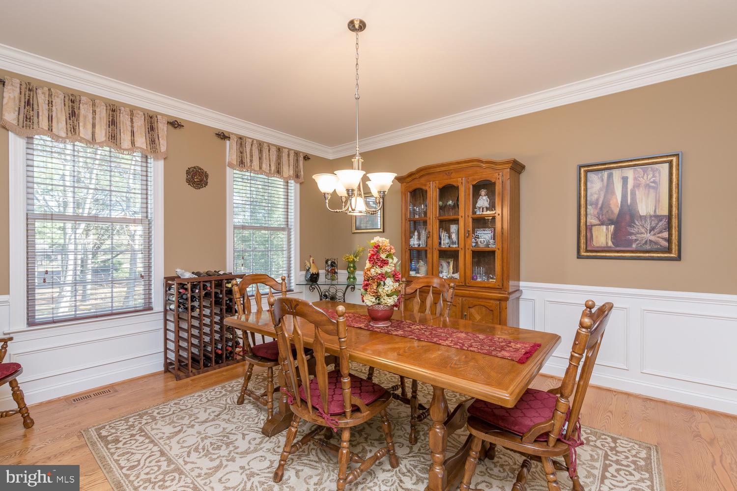 228 Southbank Road Landenberg, PA 19350 - Photo 22 of 46 Dining room with crown molding and wainscoting